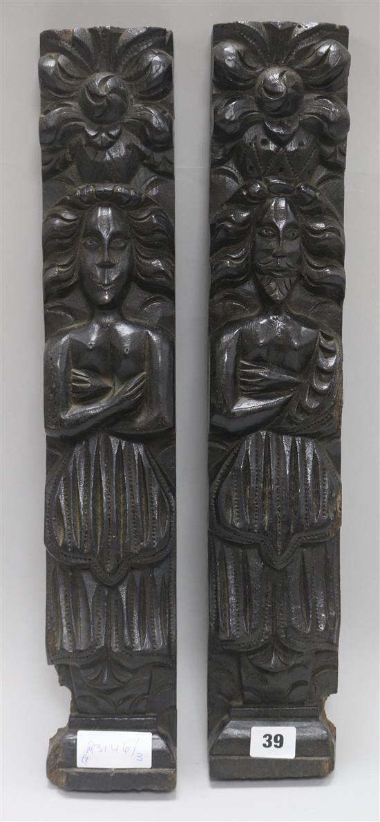A pair of 19th century carved oak cartyatids